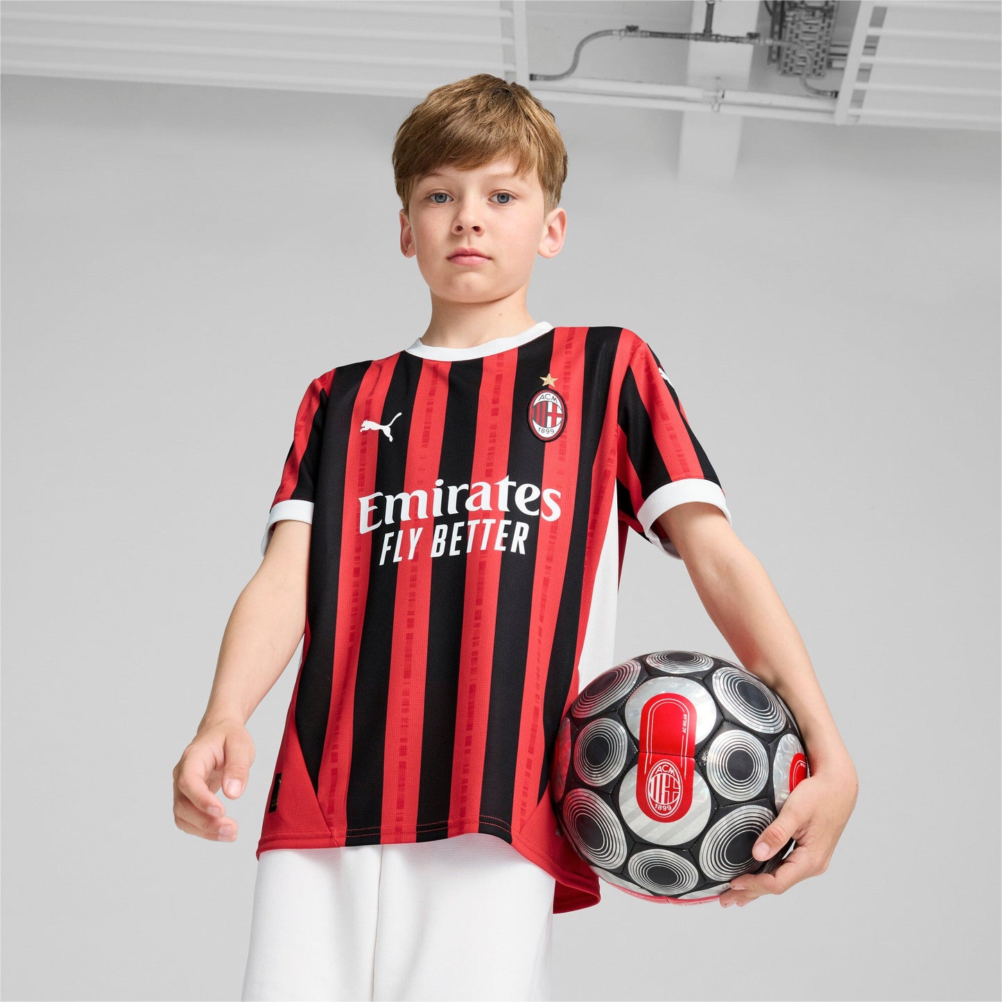 Camiseta local para niños del AC Milan 2024/25