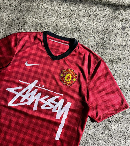 MANCHESTER UNITED X STUSSY LIMITED